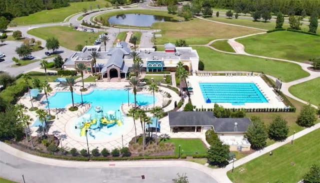 drone / aerial view with a water view