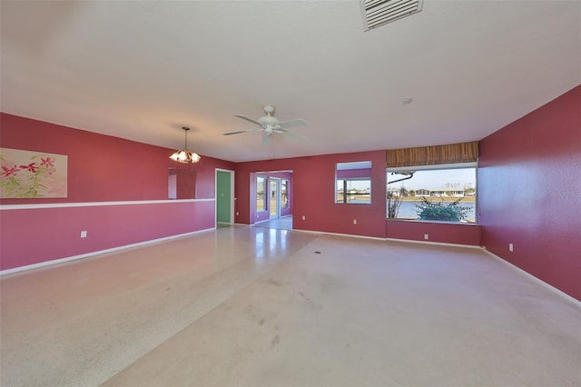 empty room featuring a notable chandelier