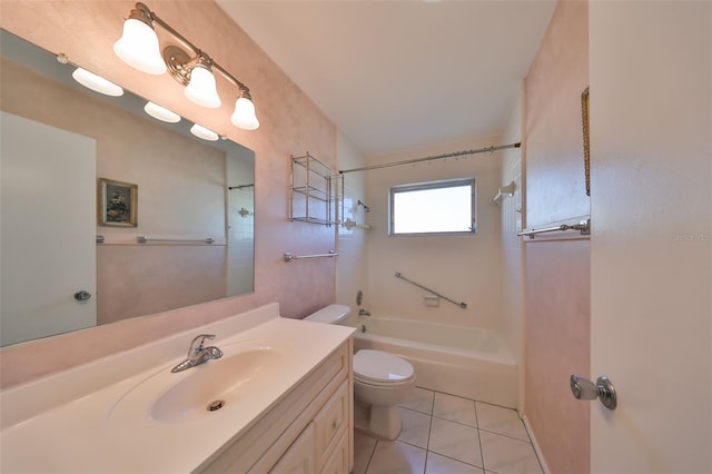 full bathroom featuring toilet, vanity, tile patterned floors, and tiled shower / bath combo