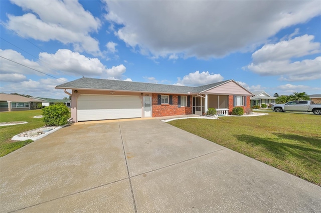 ranch-style house with a garage and a front lawn