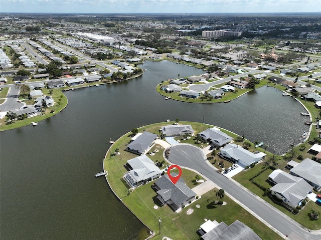 bird's eye view with a water view