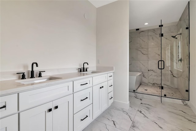 bathroom featuring recessed lighting, a marble finish shower, a sink, and marble finish floor