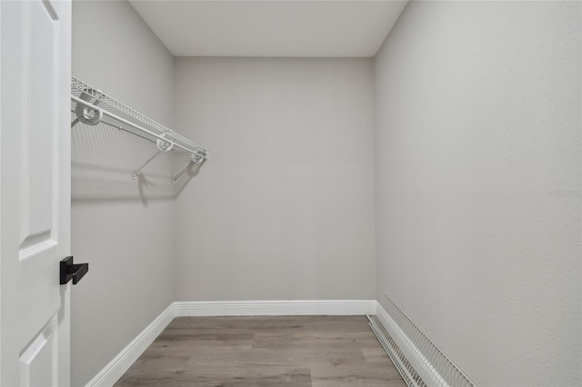 walk in closet featuring light wood-type flooring