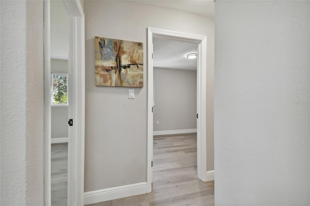 hall featuring light wood-type flooring