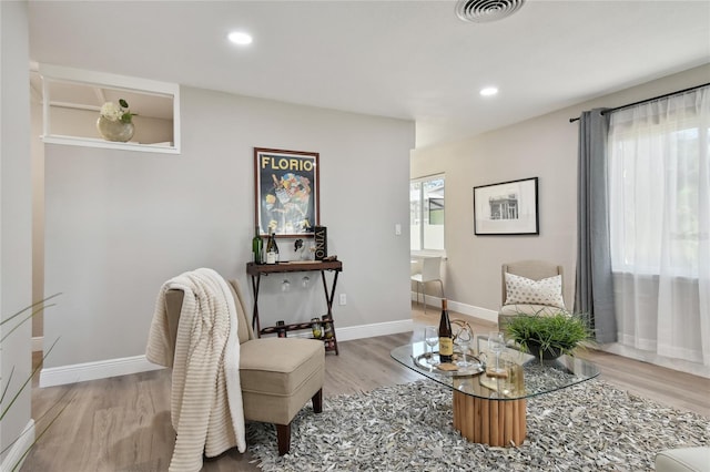 sitting room with light wood-type flooring