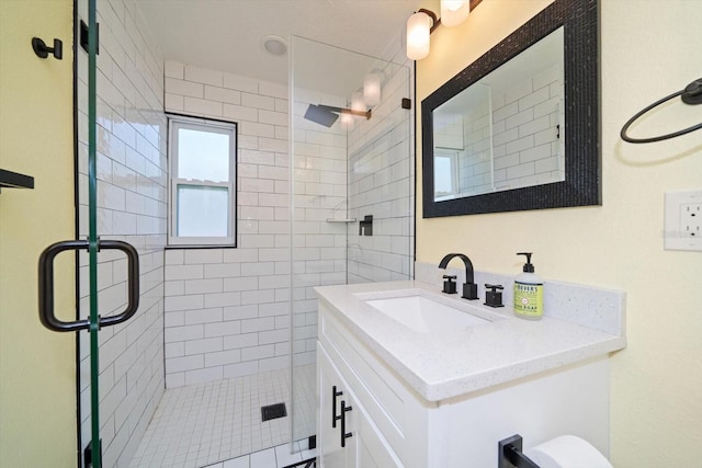 bathroom featuring vanity and walk in shower