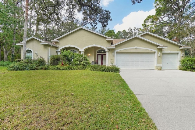 ranch-style home featuring a garage and a front lawn