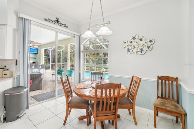 tiled dining area with ornamental molding