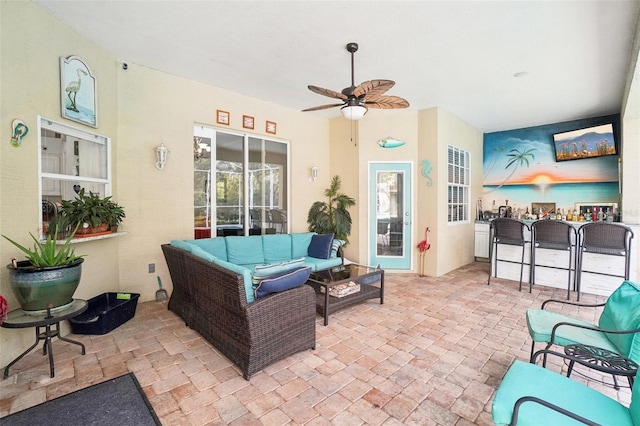 view of patio / terrace with outdoor lounge area and ceiling fan