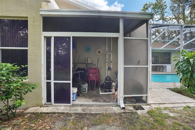 doorway to property with a patio area