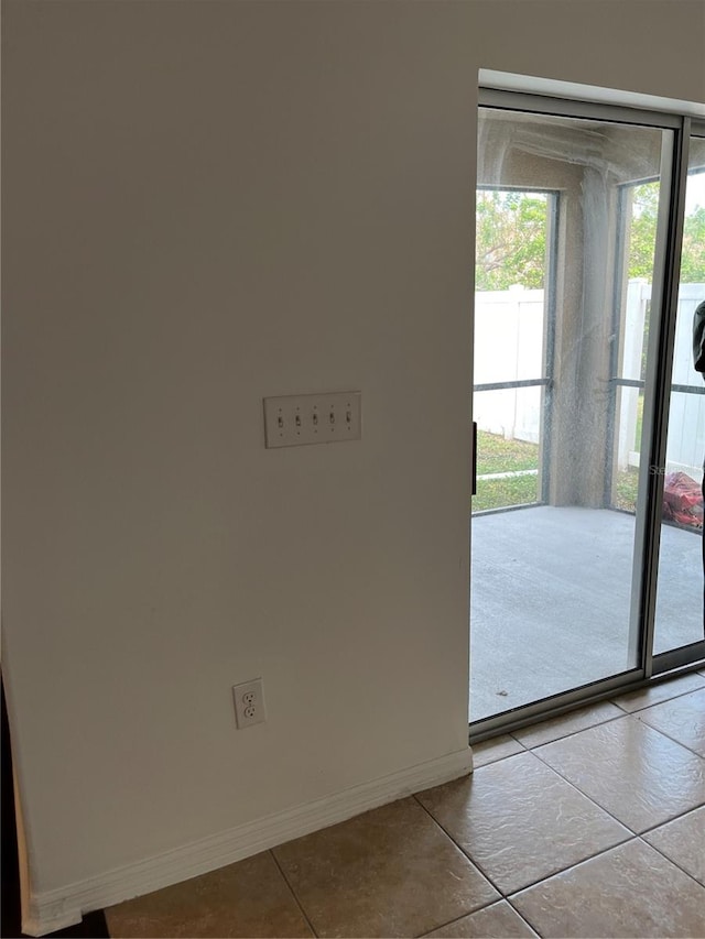 entryway with tile patterned flooring