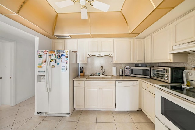 kitchen featuring white appliances, sink, ceiling fan, light tile patterned floors, and premium range hood