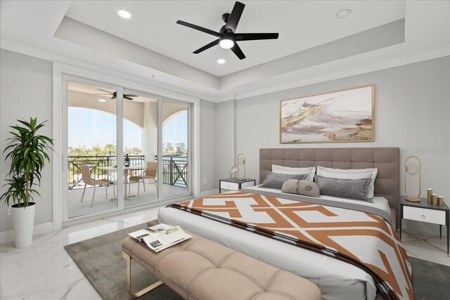 bedroom with access to outside, ceiling fan, and a tray ceiling