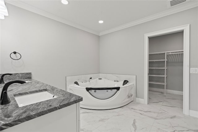 bathroom featuring a bathtub, vanity, and ornamental molding