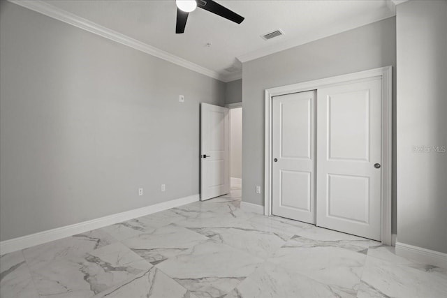 unfurnished bedroom with a closet, ceiling fan, and crown molding