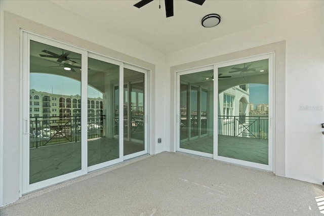 211 Dolphin Pt Unit 202, Clearwater Beach, FL 33767 - view of patio featuring ceiling fan