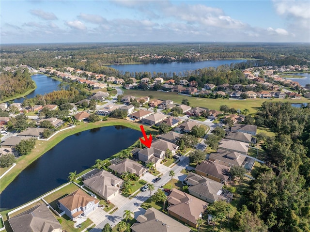 drone / aerial view featuring a water view