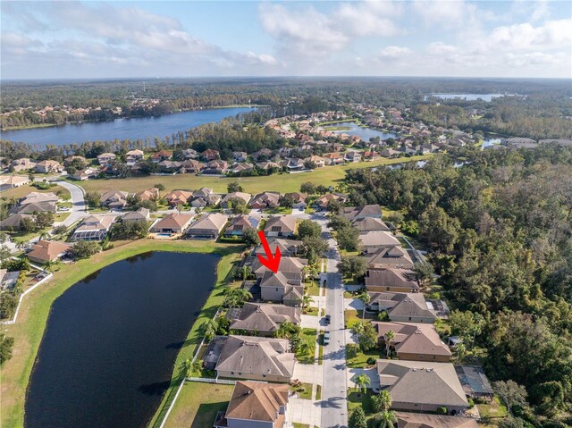 bird's eye view with a water view and a residential view