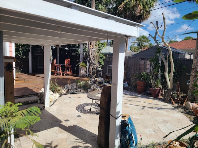 view of patio featuring a wooden deck