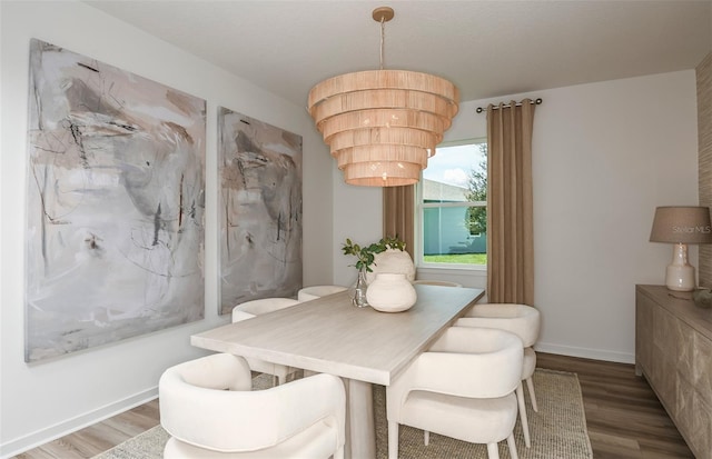 dining area with wood-type flooring