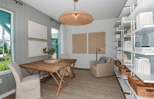 dining room with wood-type flooring