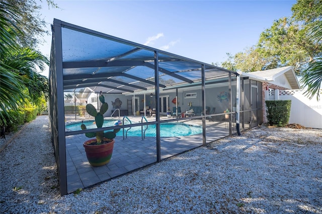 view of pool featuring a patio area and a lanai