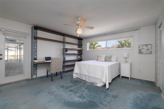 bedroom featuring ceiling fan, dark carpet, and access to outside