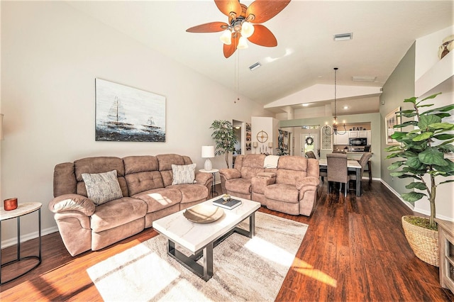 living room with ceiling fan, dark wood-type flooring, and vaulted ceiling