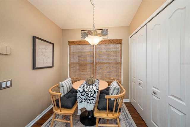 dining area featuring dark hardwood / wood-style floors