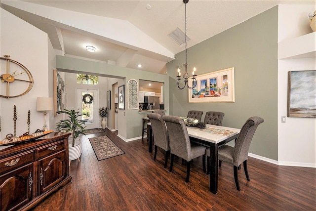 dining space featuring vaulted ceiling, a notable chandelier, and dark hardwood / wood-style floors