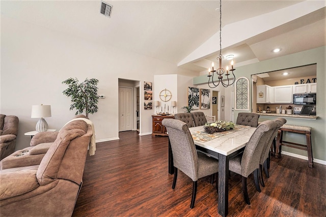 dining room with lofted ceiling, a notable chandelier, and dark hardwood / wood-style flooring