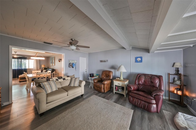 living room featuring dark wood-type flooring and ceiling fan