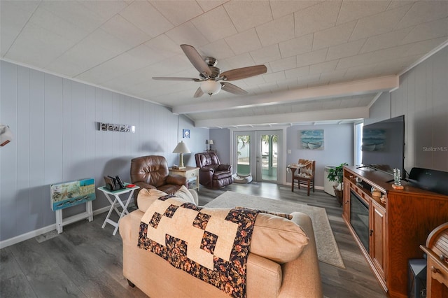 living room with beamed ceiling, dark wood-type flooring, french doors, and ceiling fan