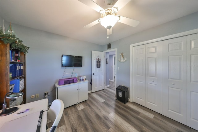 office space with hardwood / wood-style flooring and ceiling fan