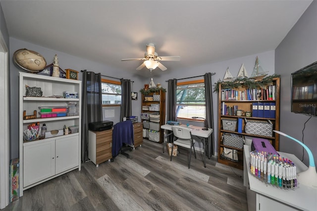 office featuring dark wood-type flooring and ceiling fan