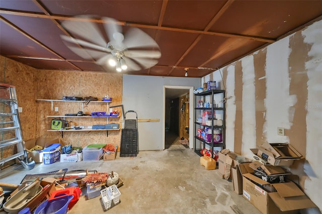 basement with ceiling fan