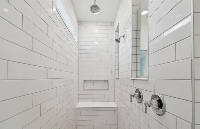 full bath featuring a tile shower