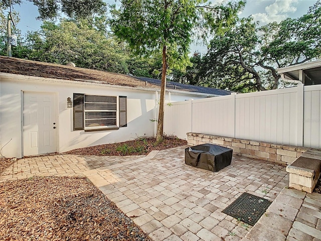 view of patio / terrace with a fire pit