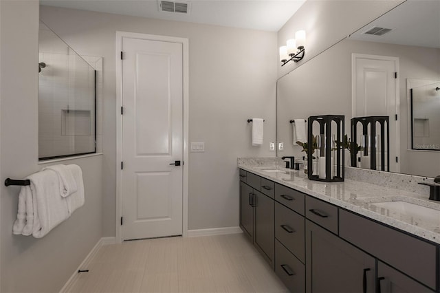 bathroom featuring vanity and walk in shower