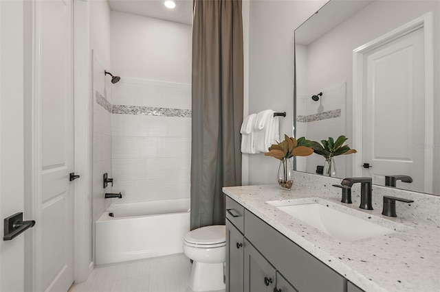 full bathroom featuring toilet, shower / bathtub combination with curtain, vanity, and tile patterned floors