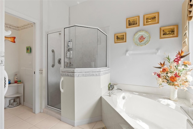 5195 Highbury Cir, Sarasota, FL 34238 - bathroom featuring tile patterned flooring, a stall shower, and a bath