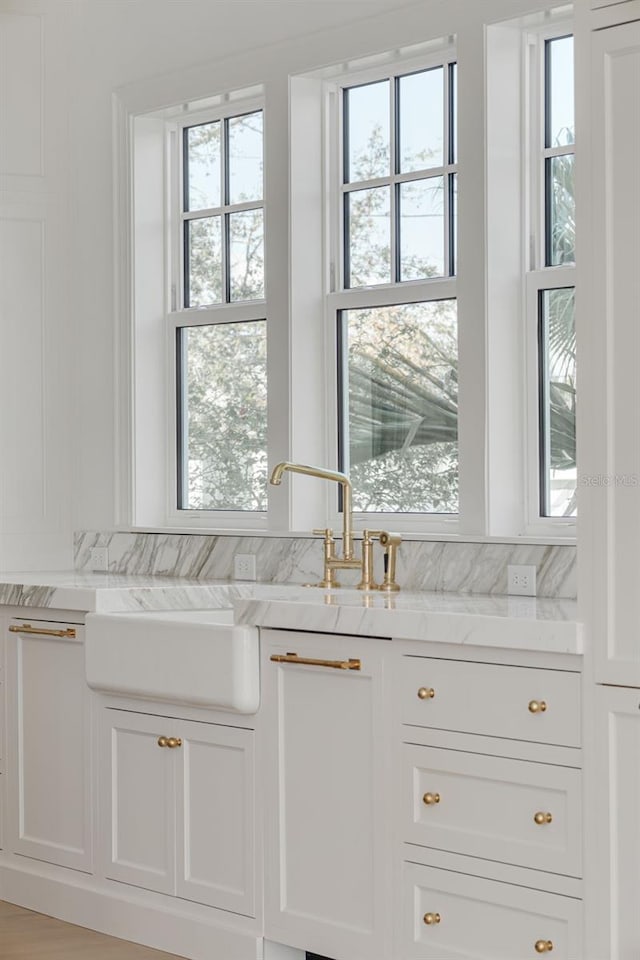 bathroom featuring vanity and plenty of natural light