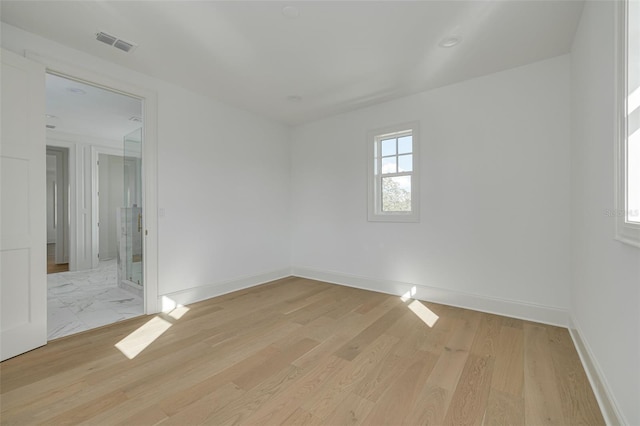 empty room featuring light hardwood / wood-style floors