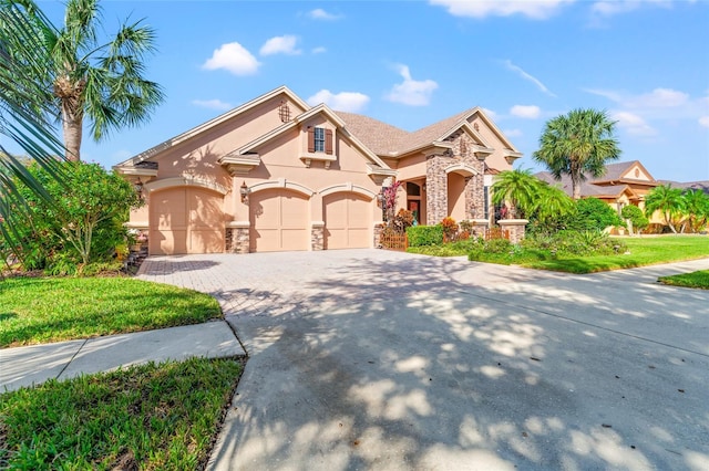 view of front of property featuring a garage