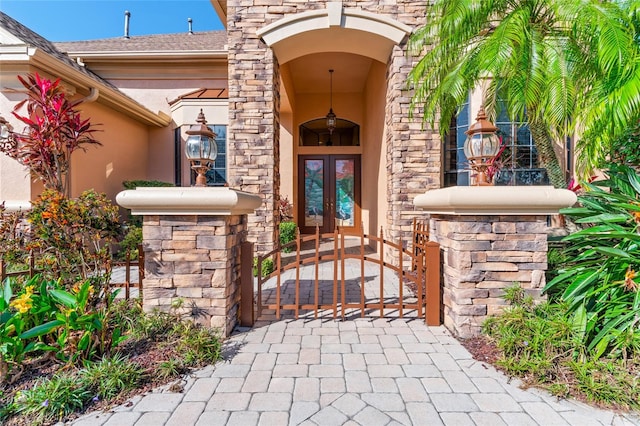 entrance to property featuring french doors