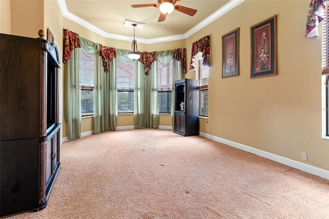 interior space with ornamental molding and light colored carpet