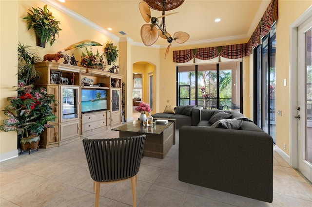 living room featuring crown molding and light tile patterned floors