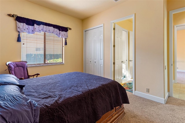 carpeted bedroom featuring a closet