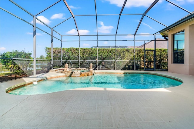 view of swimming pool with an in ground hot tub, pool water feature, a patio area, and glass enclosure