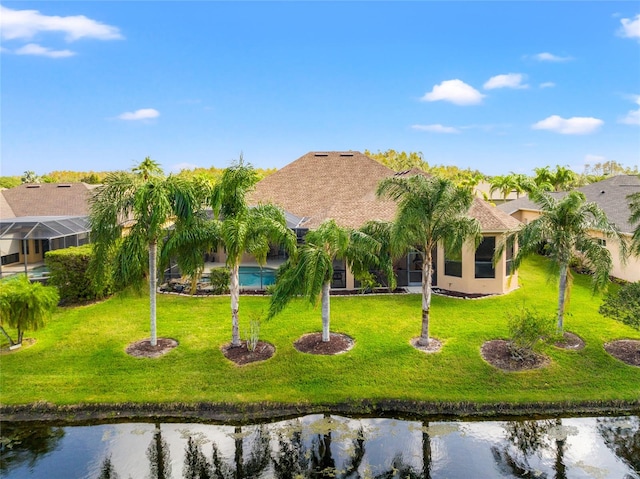 exterior space featuring a water view and a front yard